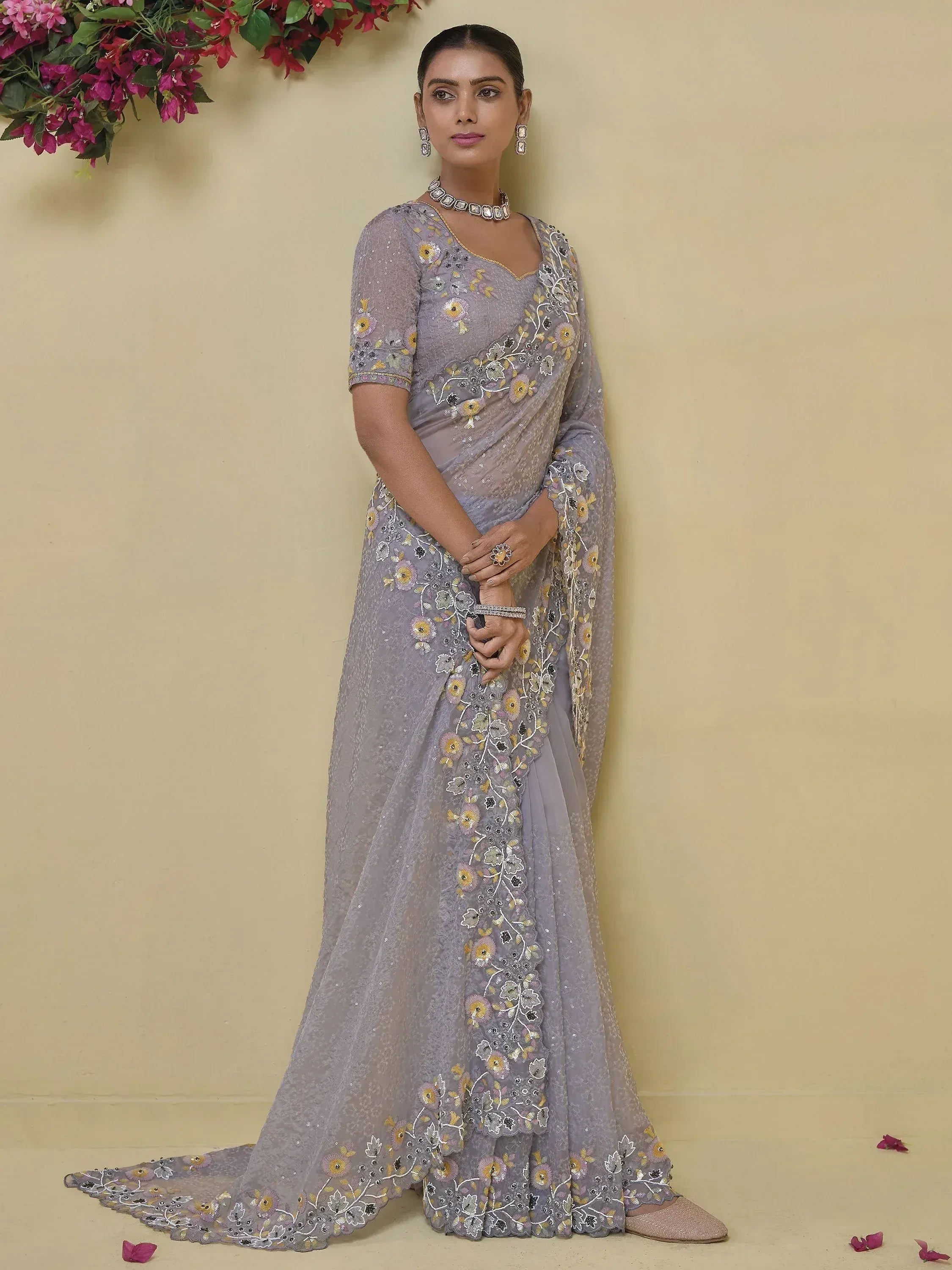 Elegant lavender saree with floral embroidery and sequins, perfect for Indian ethnic occasions