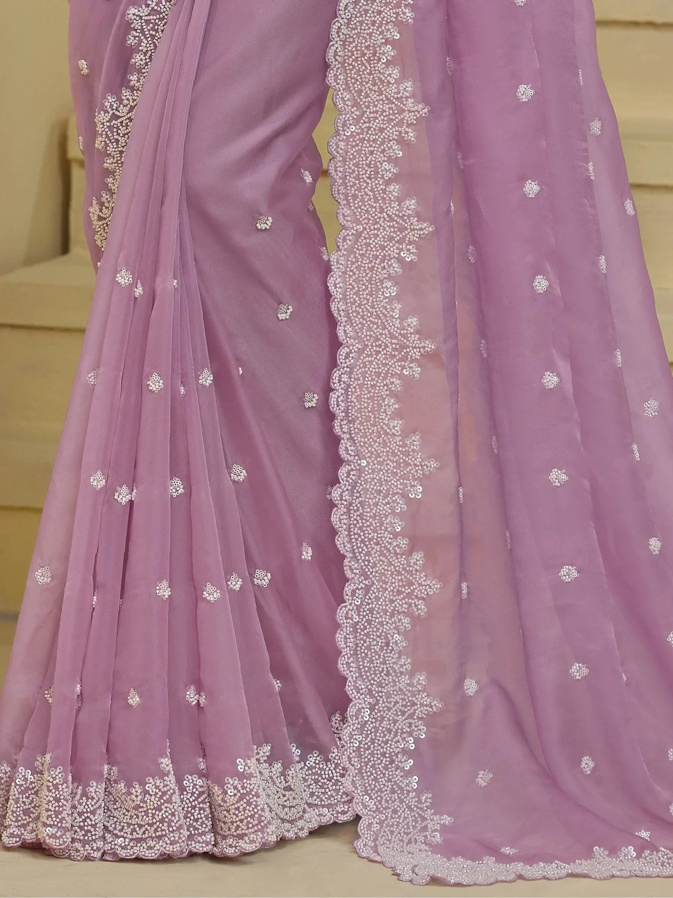 Pink designer lehenga with intricate silver embroidery and sequin detailing for ethnic wear