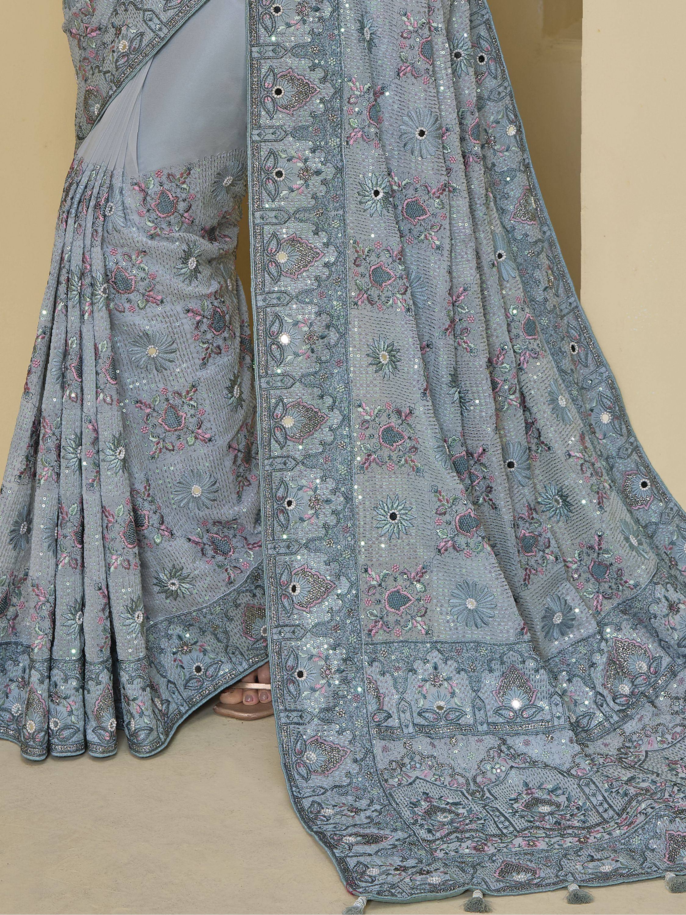 Grey floral embroidered lehenga choli with sequins and mirror work, perfect for Indian ethnic occasions.