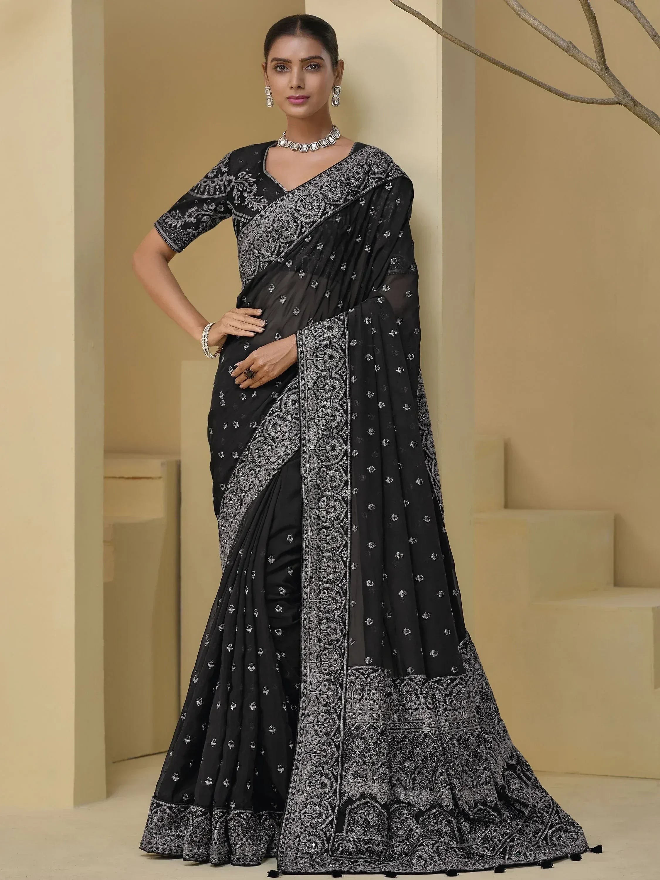 Black embroidered saree with silver work, perfect for ethnic occasions and Indian weddings