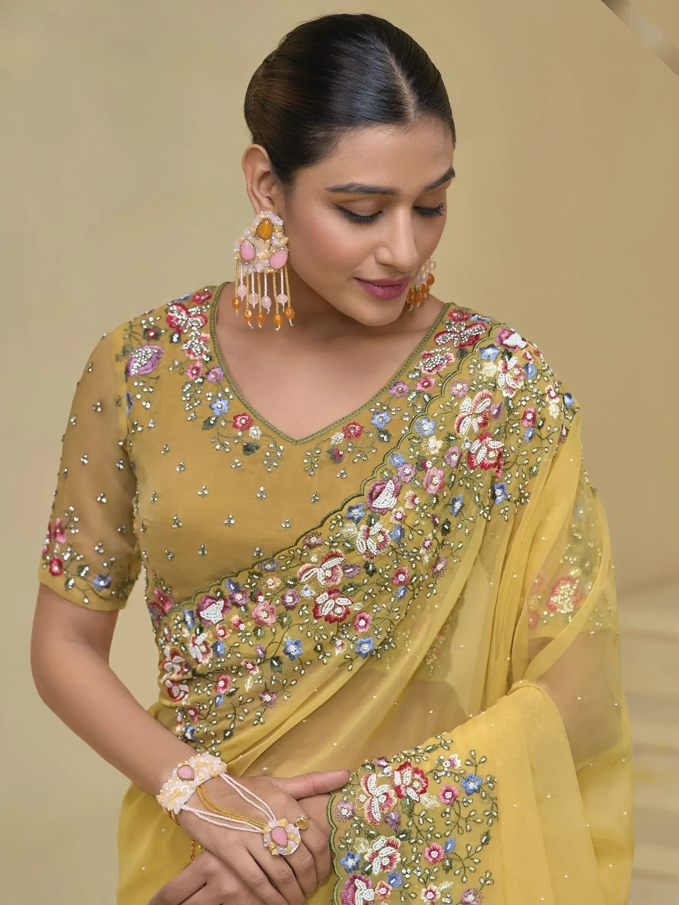 Yellow floral embroidered saree with matching blouse, perfect for Indian ethnic occasions