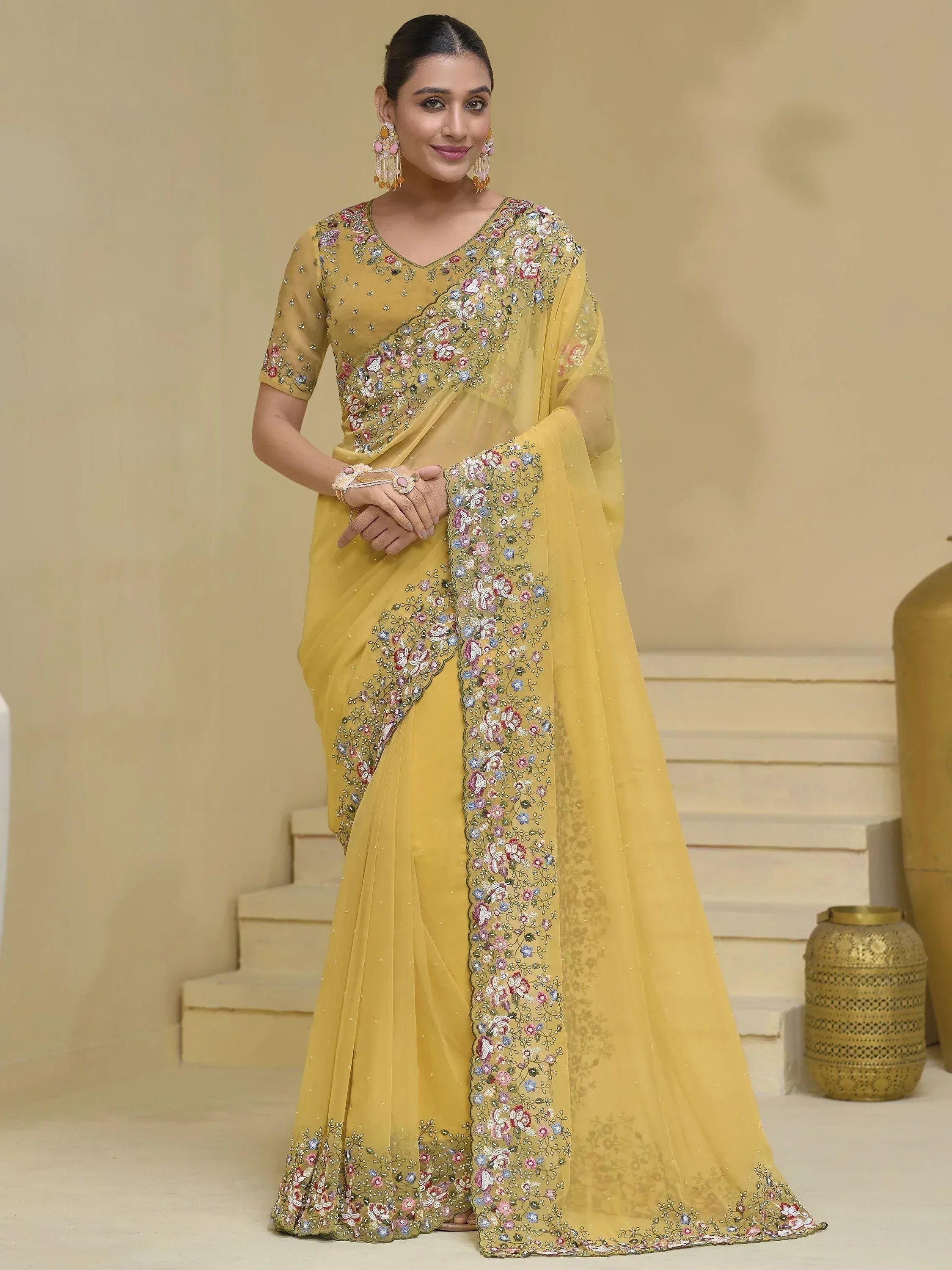 Yellow floral embroidered saree with designer blouse, perfect for Indian ethnic occasions