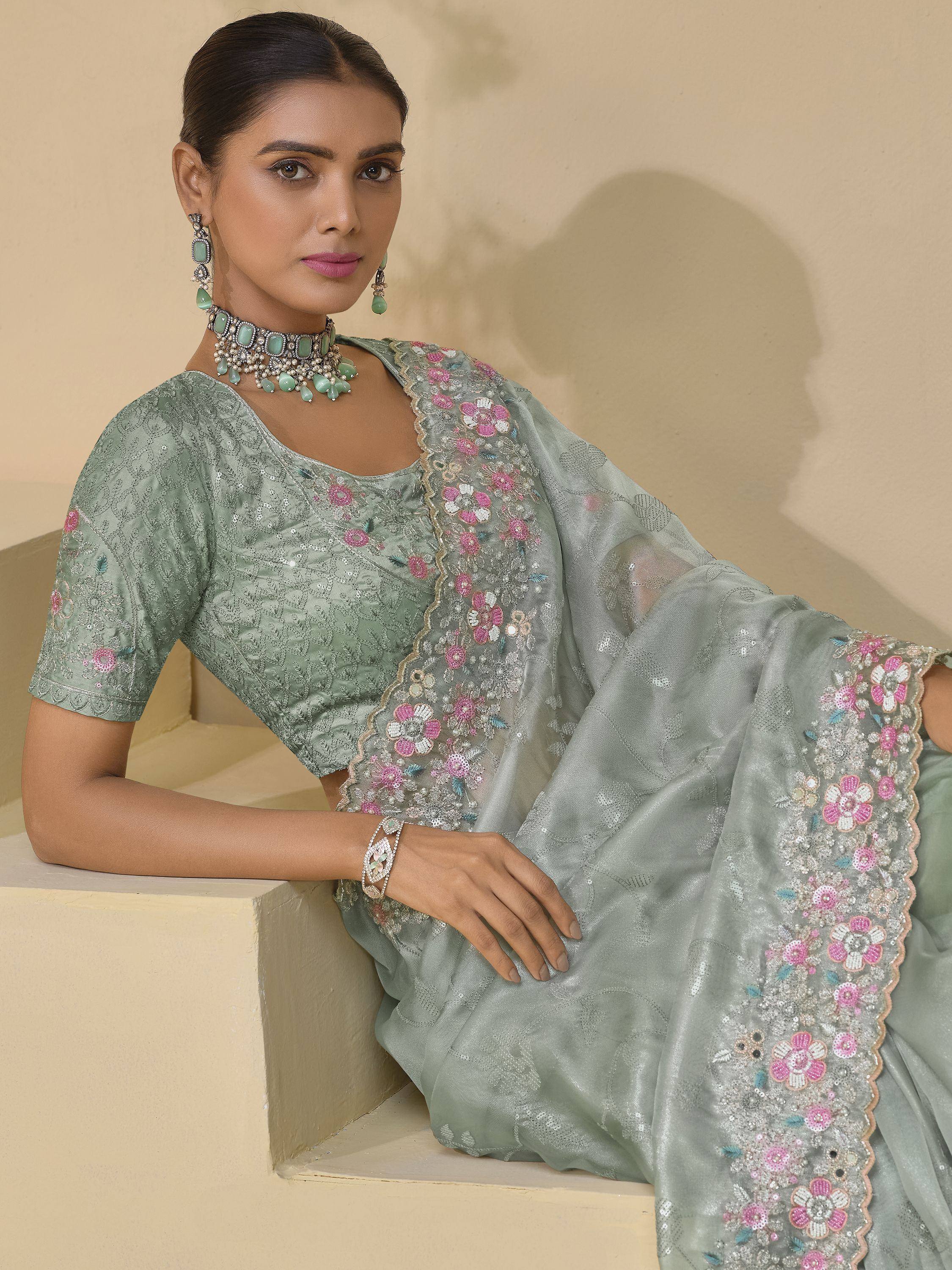 Mint green embroidered saree with floral sequin work, perfect for Indian ethnic occasions