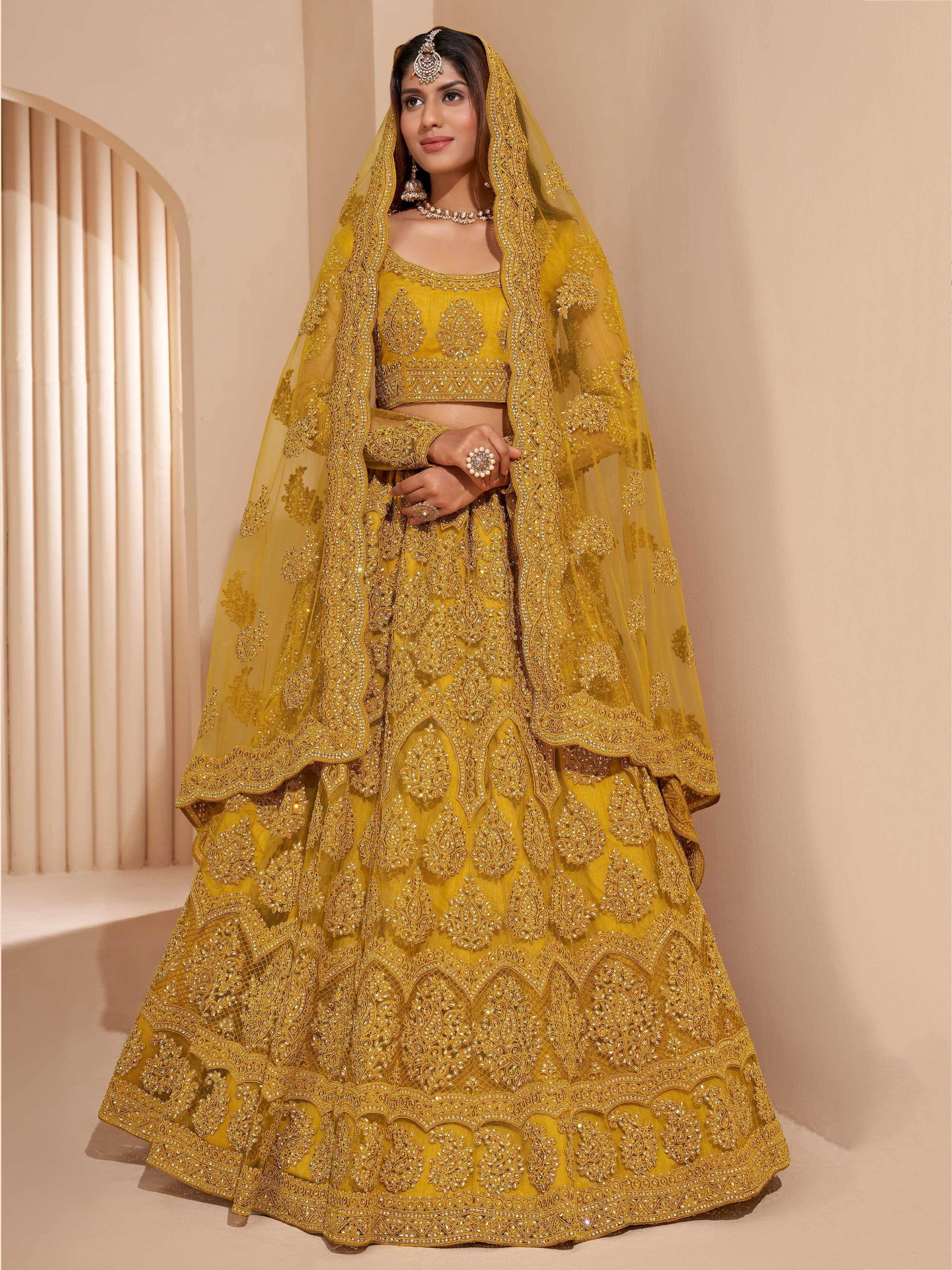 Yellow designer lehenga choli with heavy embroidery and dupatta, Indian ethnic wear for weddings