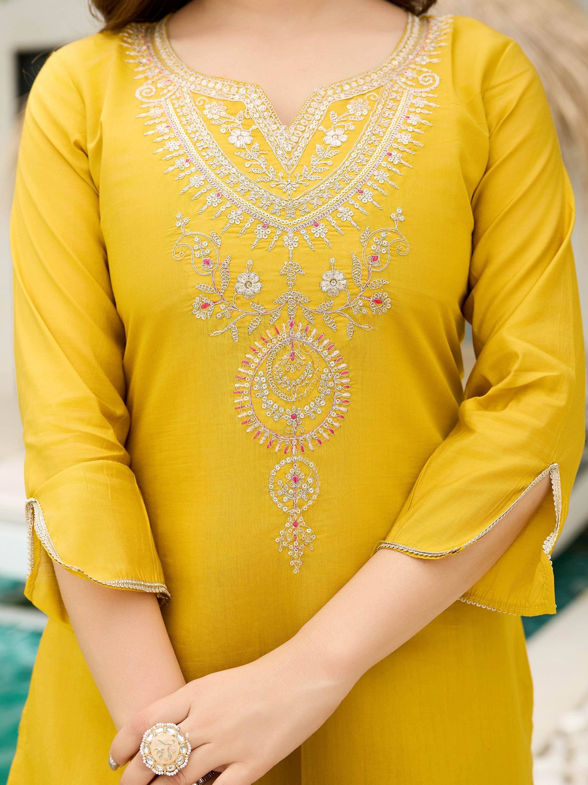 Yellow ethnic kurti with white and pink floral embroidery, bell sleeves, and V-neck design