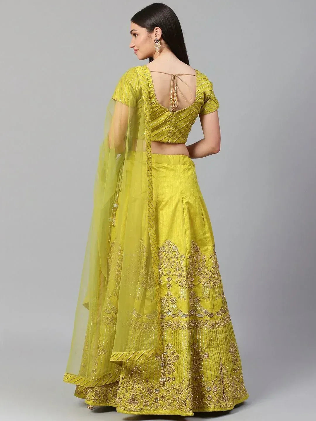 Yellow embroidered lehenga choli with back tie blouse and sheer dupatta, Indian ethnic wear