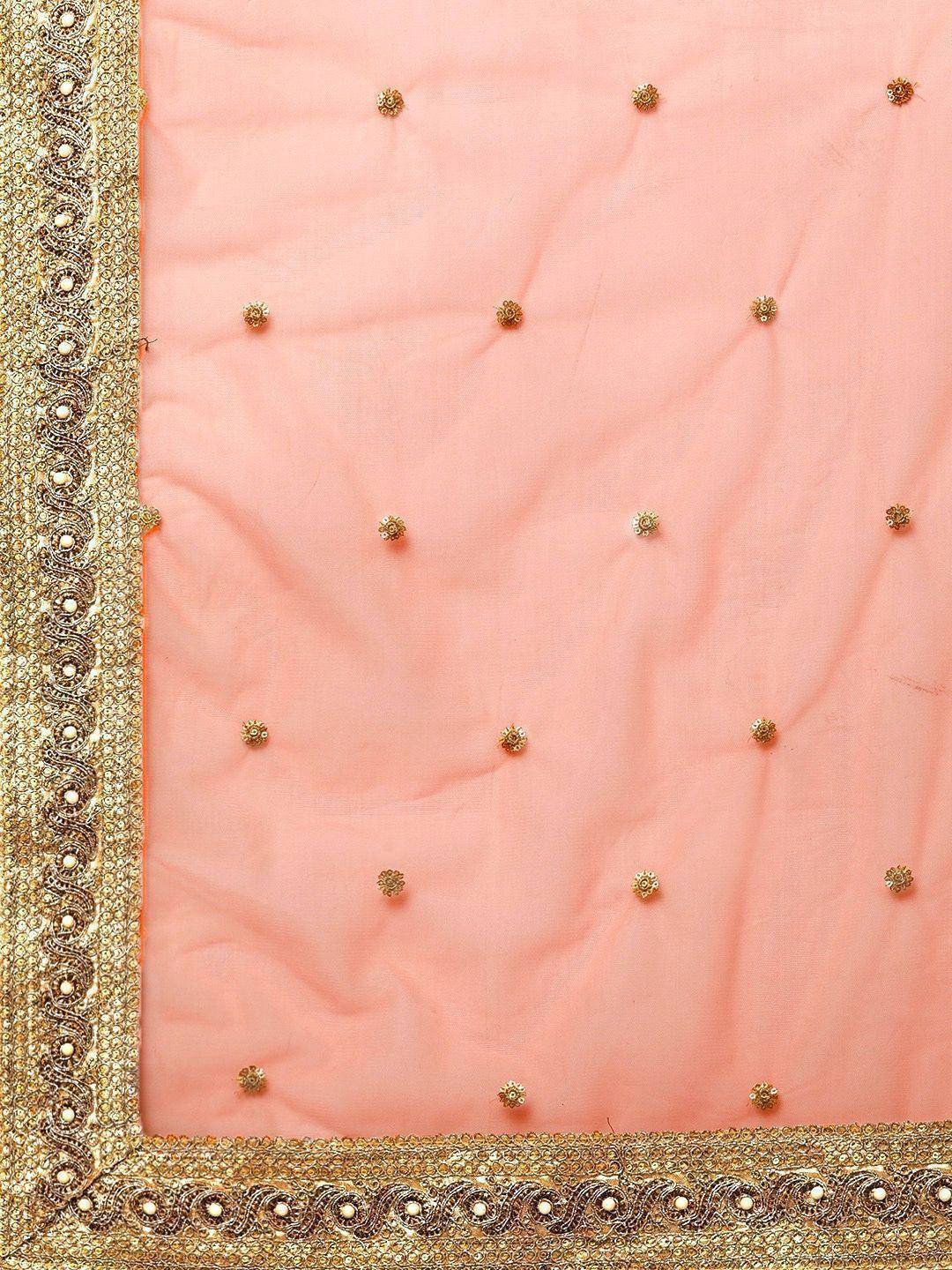 Peach ethnic saree with gold floral embroidery and ornate border detailing