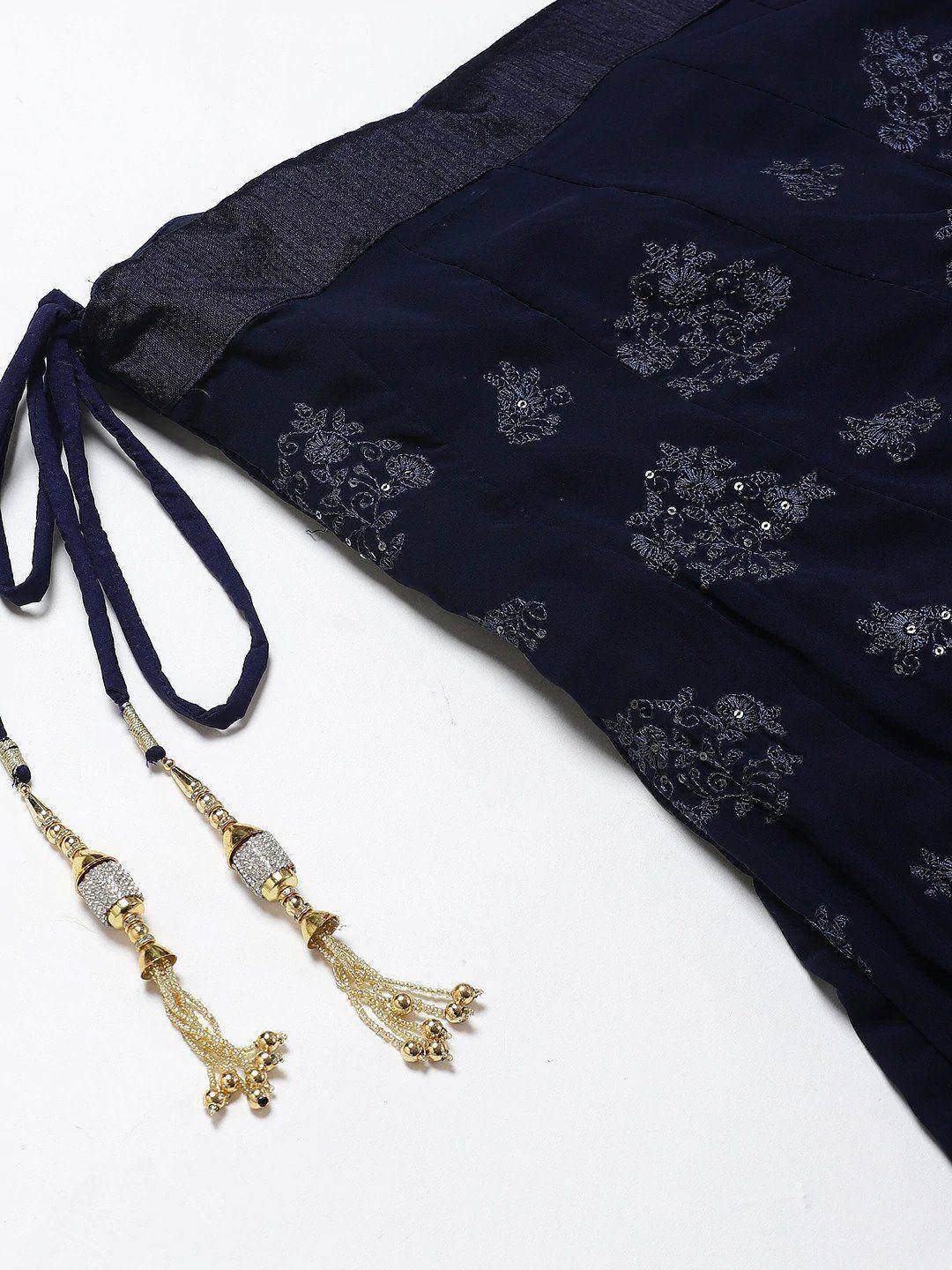 Navy blue ethnic gown with floral embroidery and gold tassels, perfect for Indian occasions