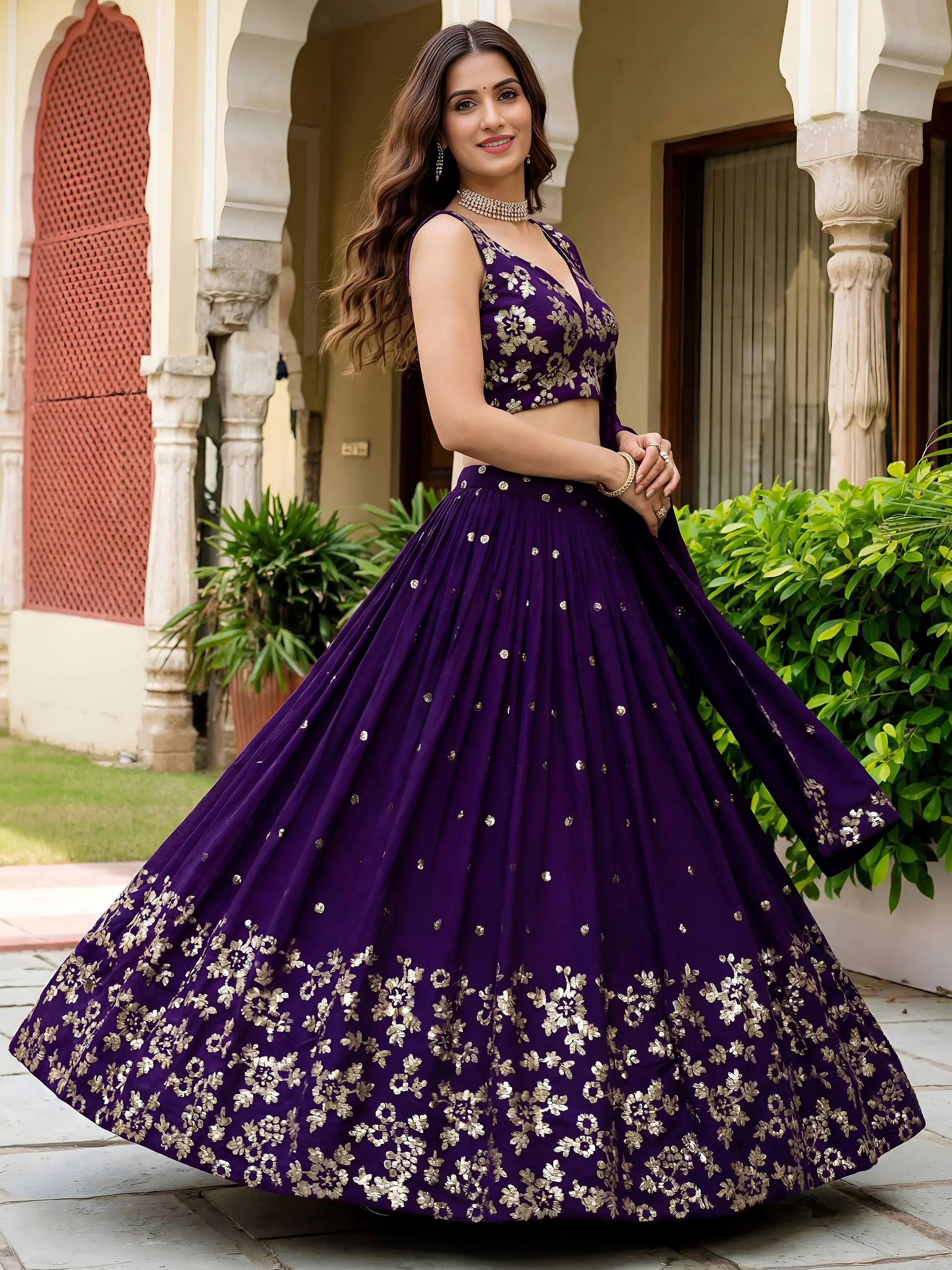 Outstanding Purple Sequins Georgette Wedding Wear Lehenga Choli