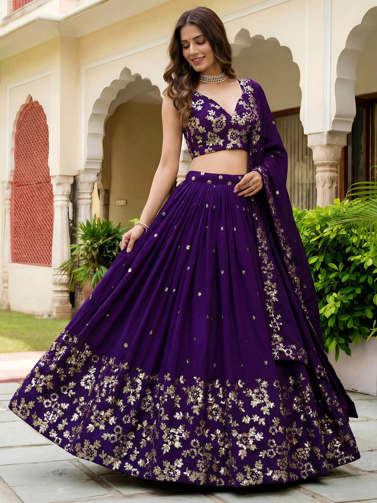Outstanding Purple Sequins Georgette Wedding Wear Lehenga Choli