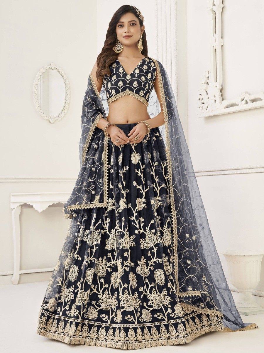 Navy blue designer lehenga choli with gold floral embroidery and sheer dupatta, perfect for Indian weddings