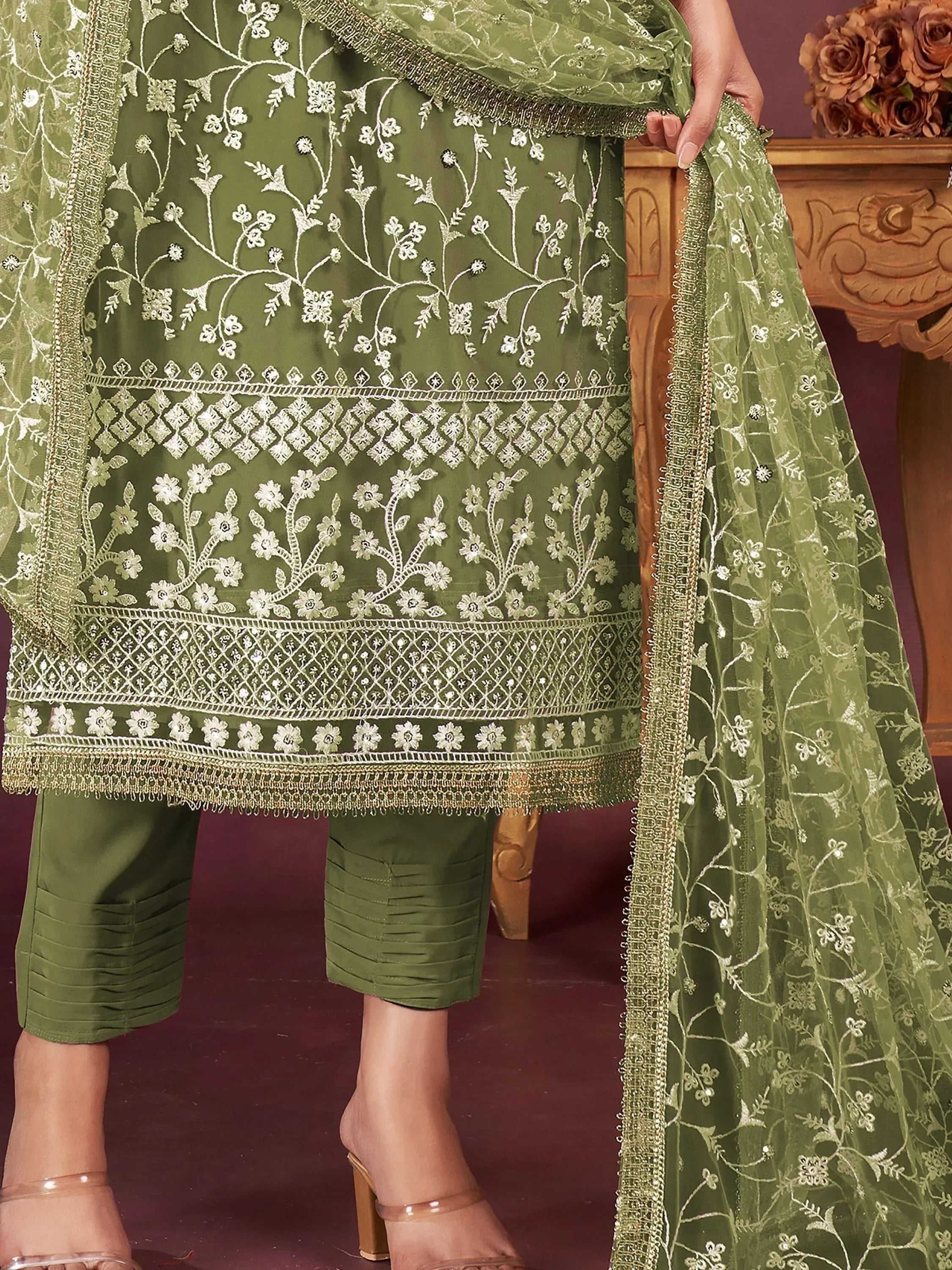 Olive green embroidered salwar kameez with floral patterns and matching dupatta