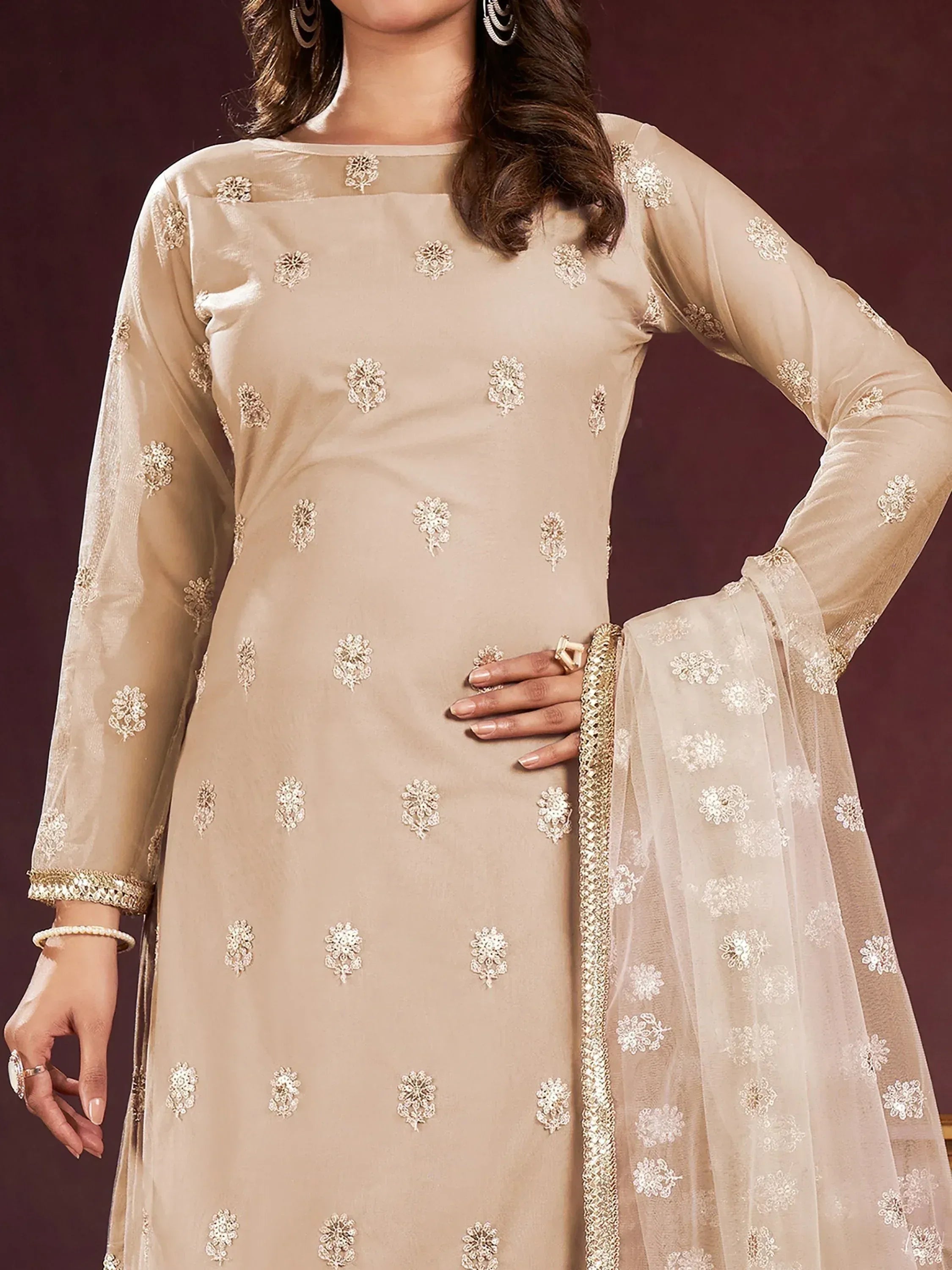 Beige embroidered salwar kameez with floral motifs and sheer dupatta for ethnic wear