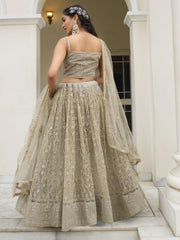 Mesmerizing Ivory Sequins Net Engagement Wear Lehenga Choli