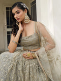 Mesmerizing Ivory Sequins Net Engagement Wear Lehenga Choli
