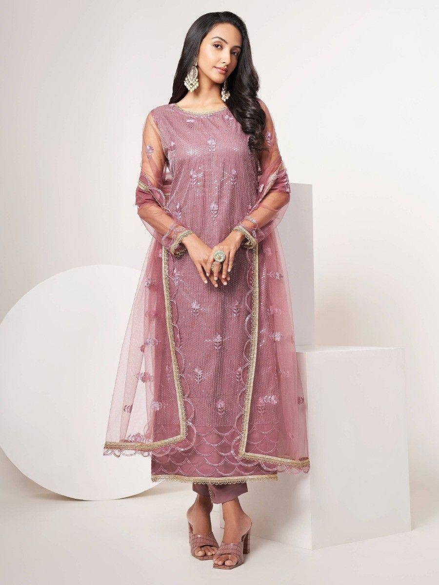 Elegant pink embroidered ethnic gown with sheer sleeves and gold trim, styled for festive occasions.