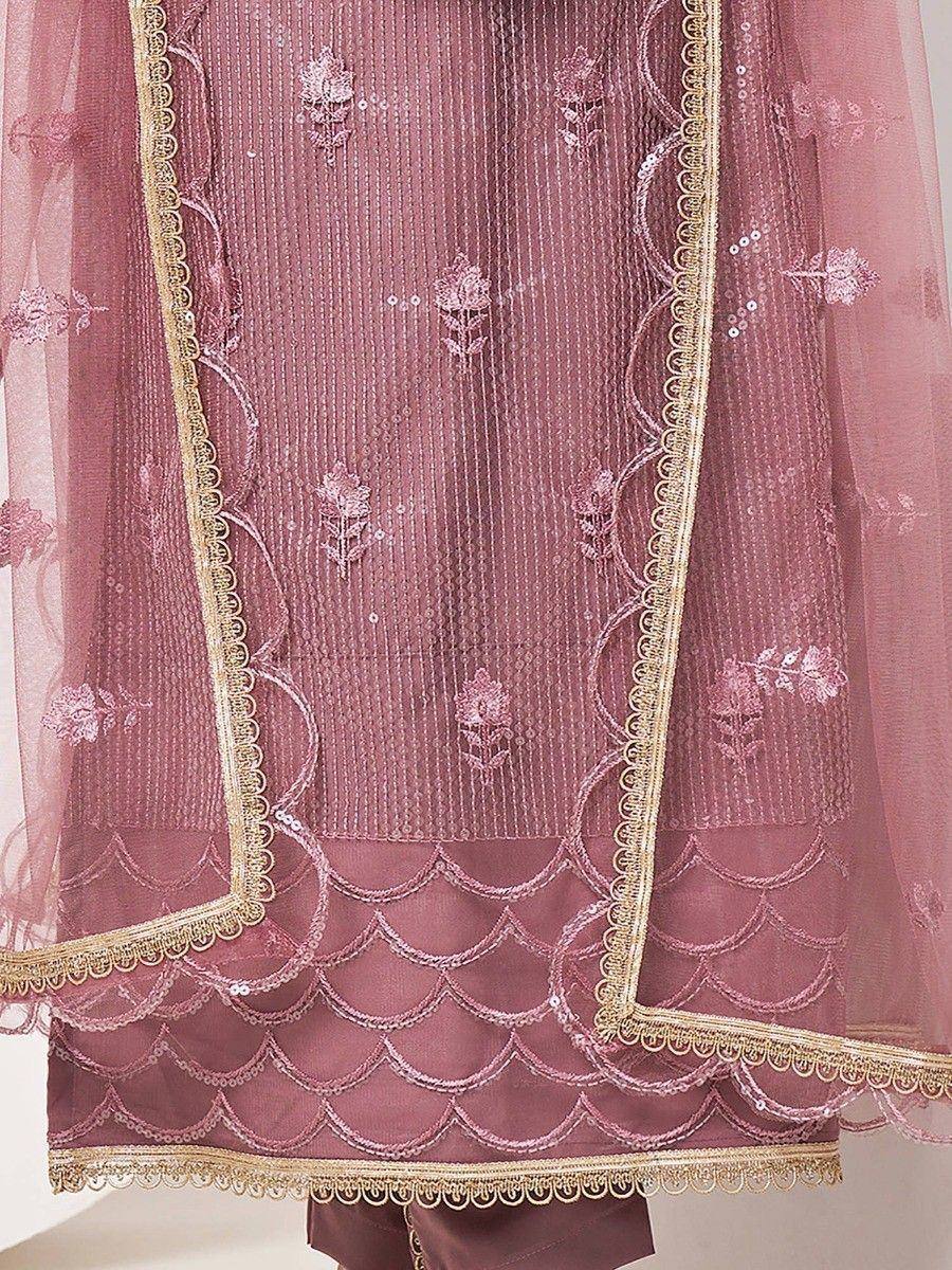 Elegant pink ethnic gown with floral embroidery and scalloped hem, perfect for festive occasions.