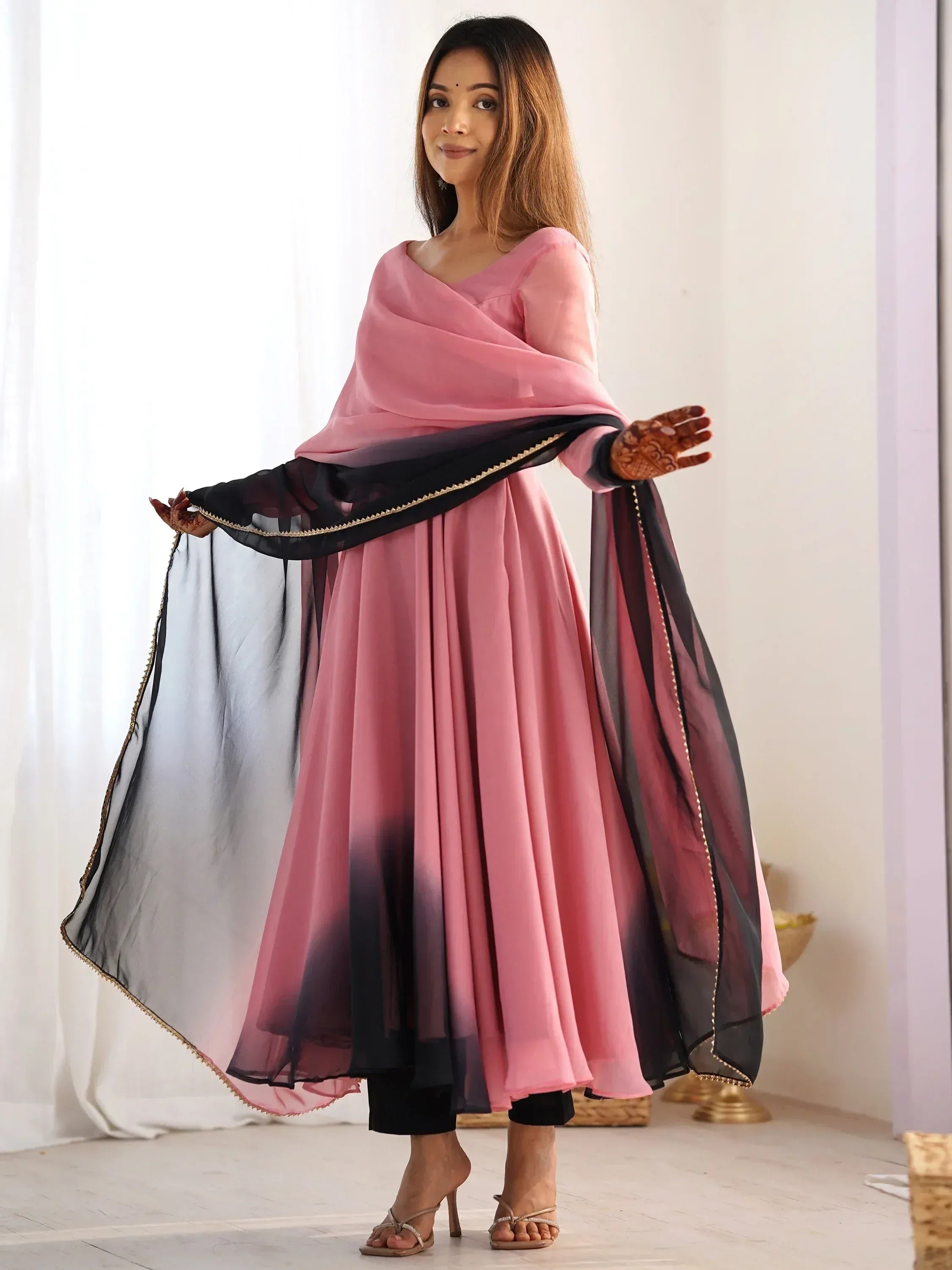 Pink and black ombre ethnic gown with dupatta, perfect for Indian occasions and festive wear.