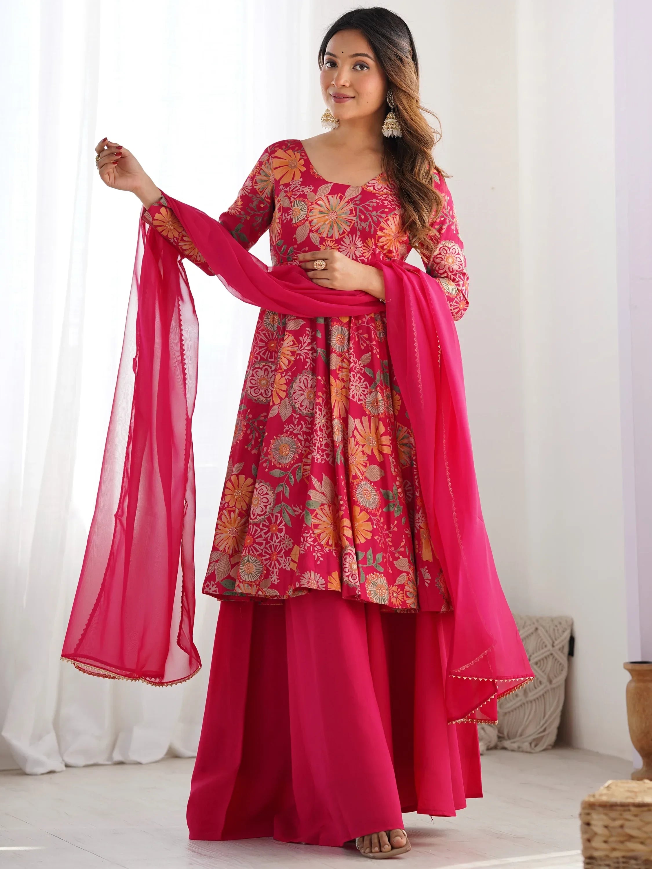 Attractive Rani Pink Floral Printed Silk Festival Wear Palazzo Suit