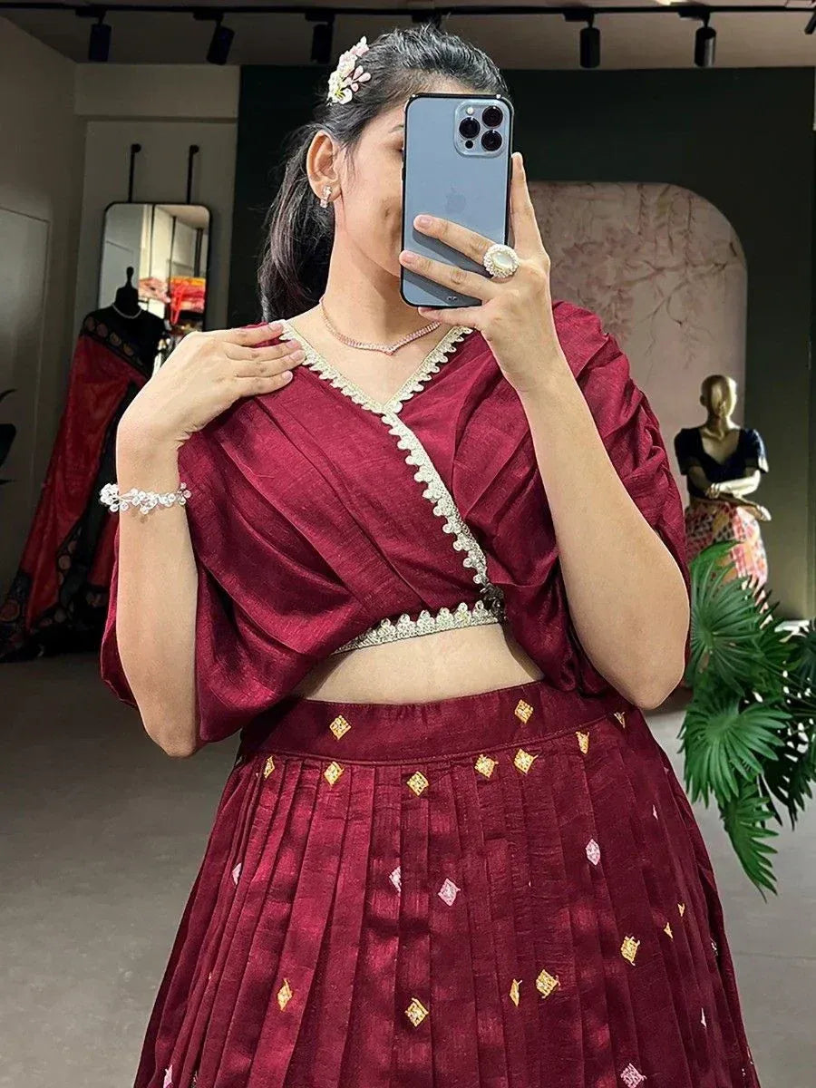 Maroon lehenga choli with gold embroidery, perfect for Indian ethnic wear and festive occasions
