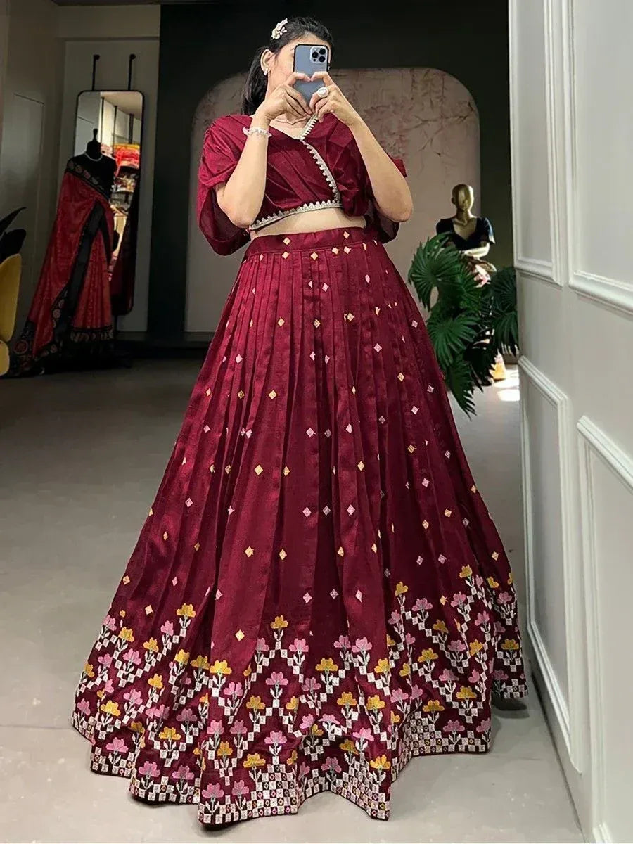 Maroon lehenga choli with floral embroidery, perfect for Indian ethnic wear and festive occasions.