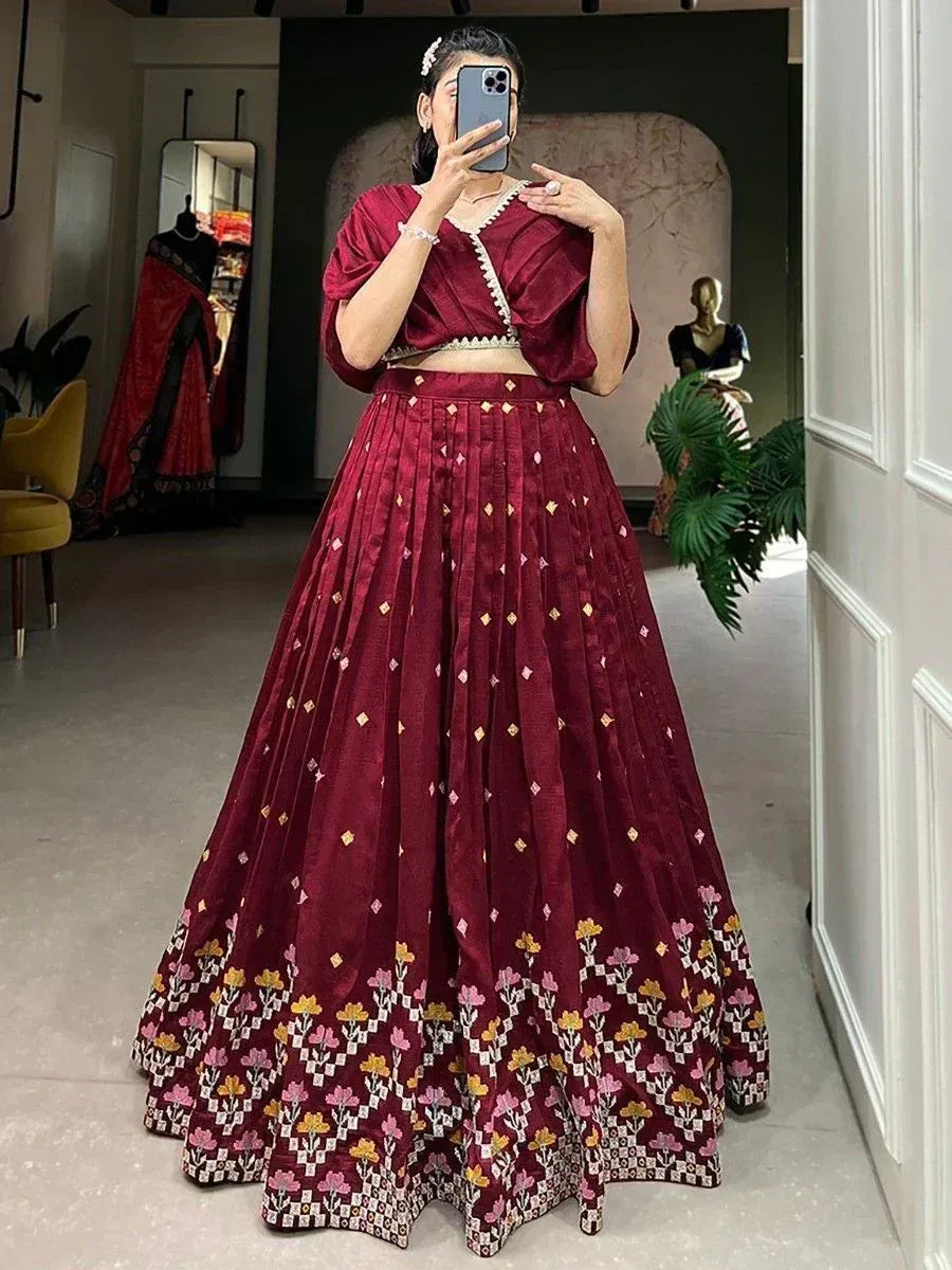 Maroon lehenga choli with floral embroidery, perfect for Indian ethnic wear and festive occasions.