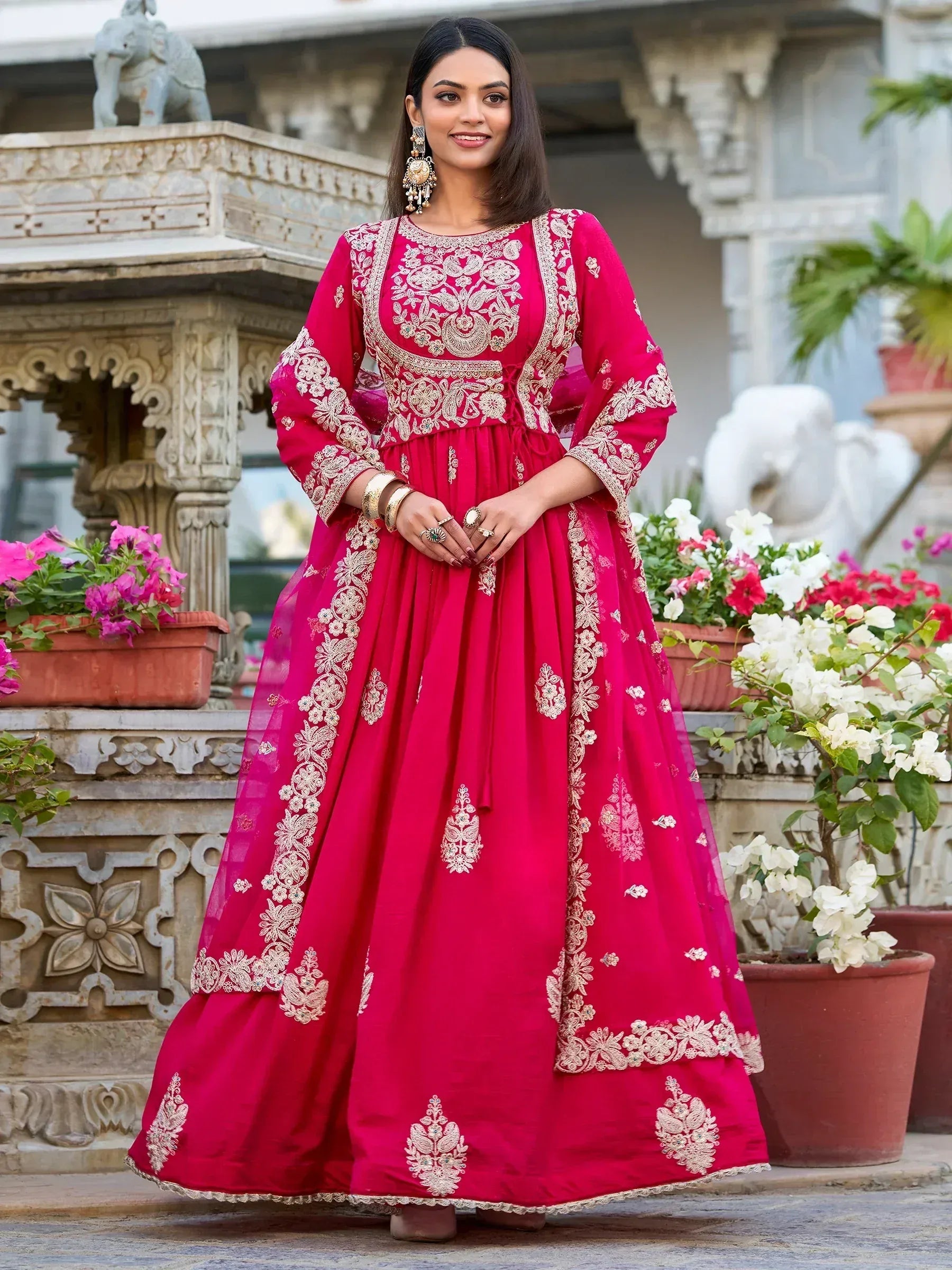 Elegant pink embroidered anarkali suit with gold detailing, perfect for Indian ethnic occasions
