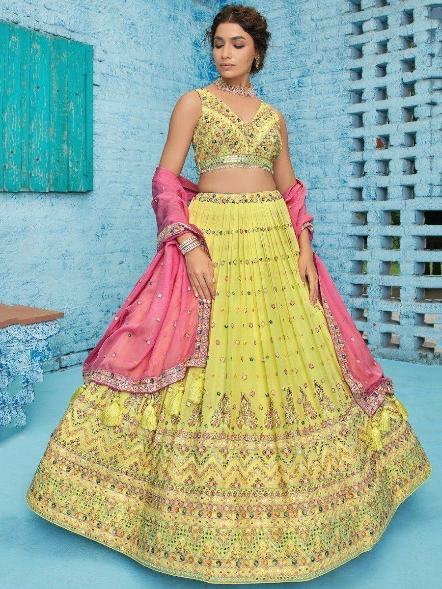 Yellow embroidered lehenga choli with pink dupatta, Indian ethnic wear for weddings and festivals