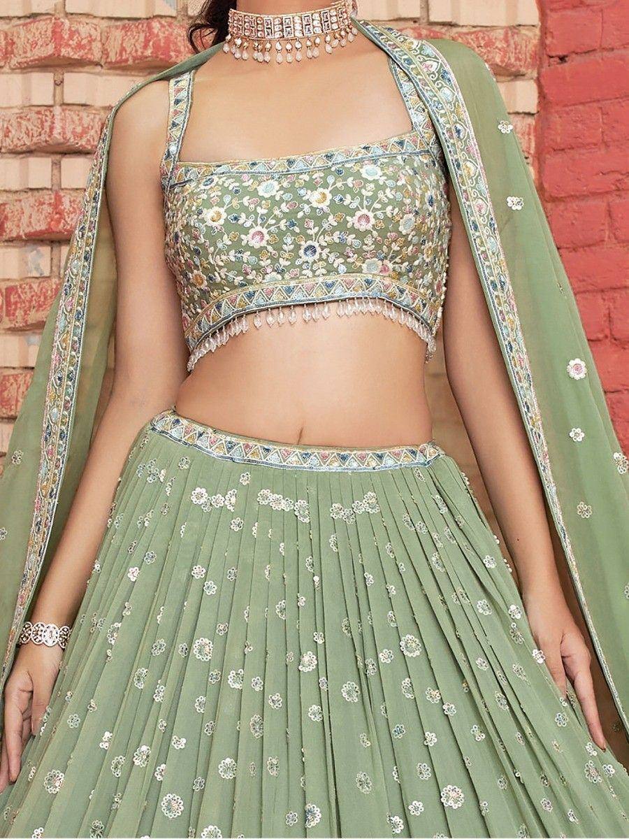 Green floral embroidered lehenga choli with dupatta, perfect for Indian ethnic wear occasions
