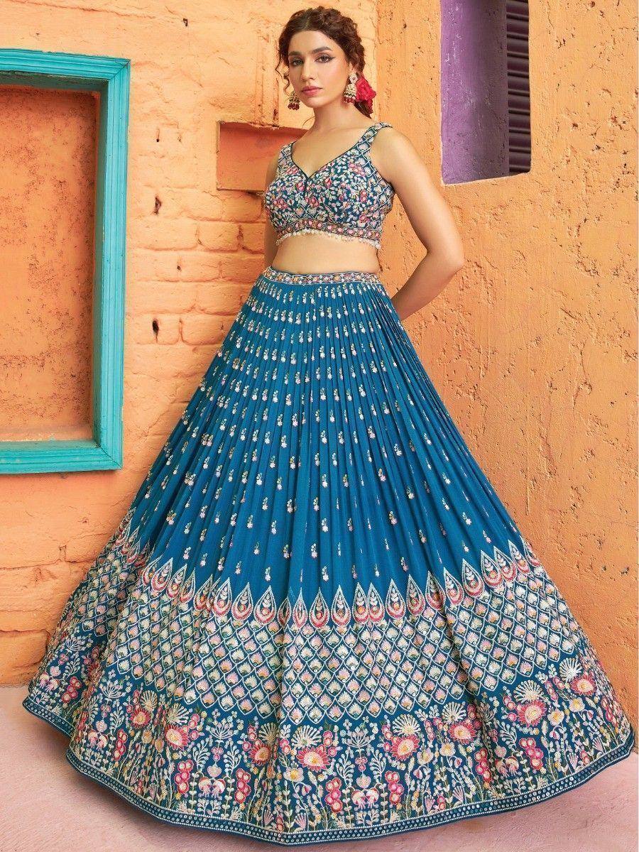 Blue floral lehenga choli with embroidered dupatta, perfect for Indian weddings and festive occasions