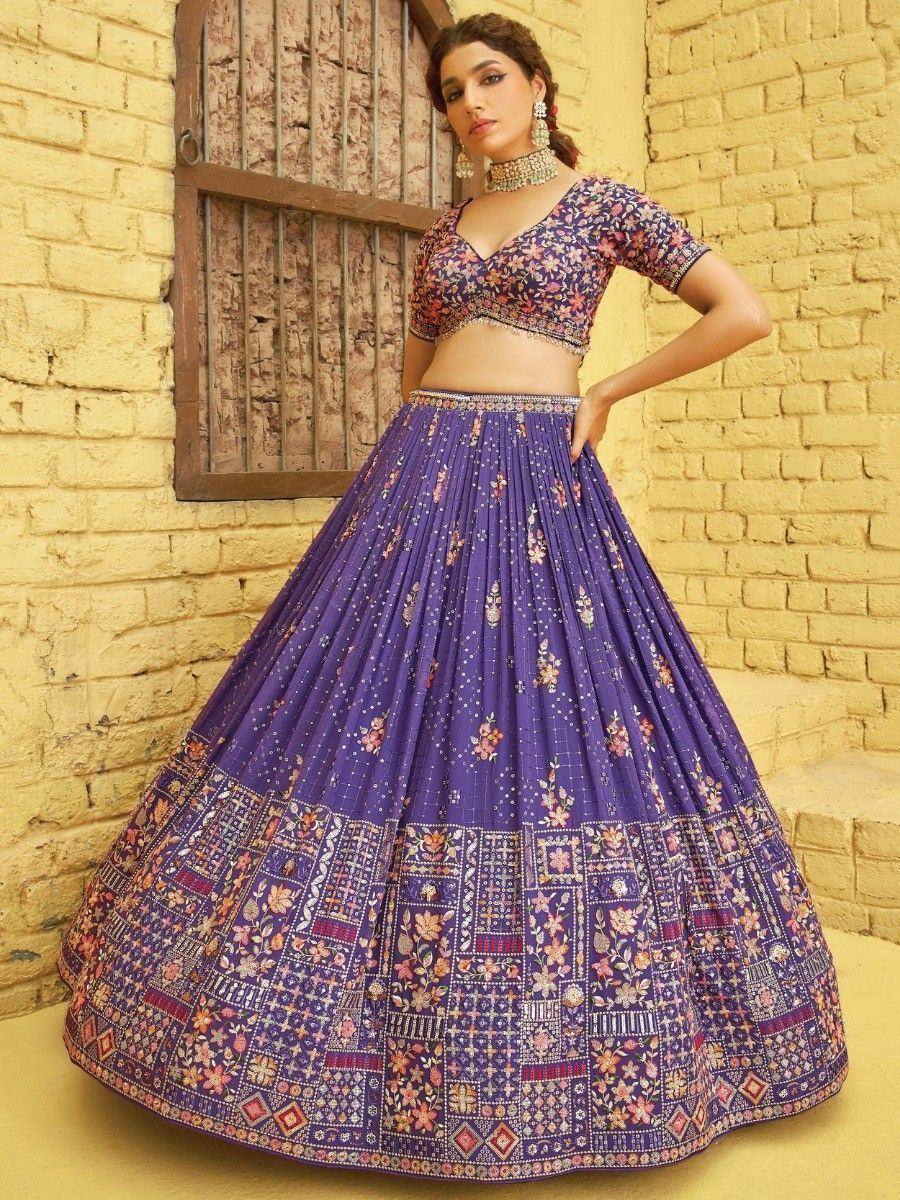 Purple floral lehenga choli with embroidered blouse and pleated skirt, perfect for Indian ethnic occasions