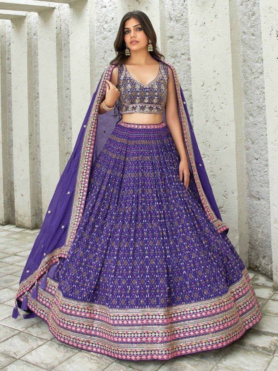 Purple printed lehenga choli with embroidered blouse and dupatta, ethnic Indian wear for women