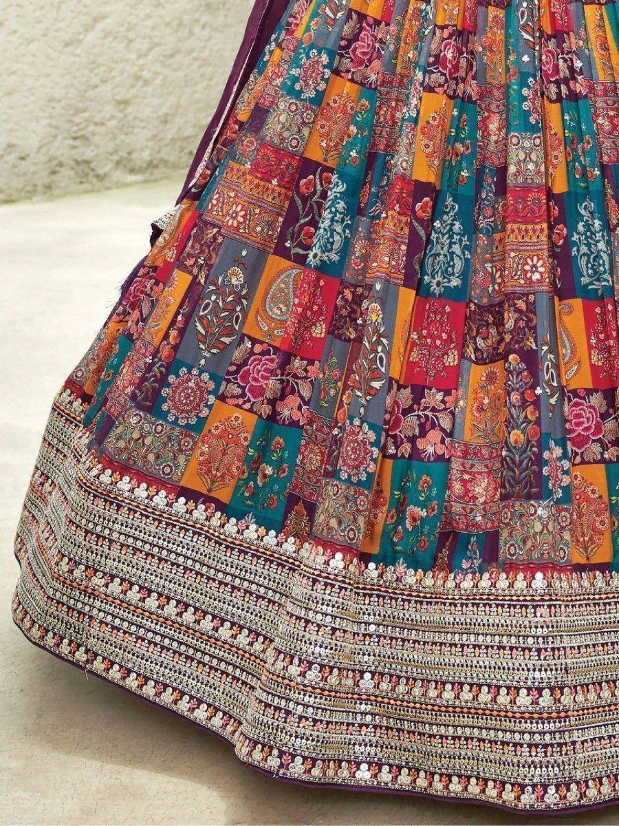 Colorful patchwork lehenga skirt with floral and paisley prints, intricate embroidery, and sequin border detail