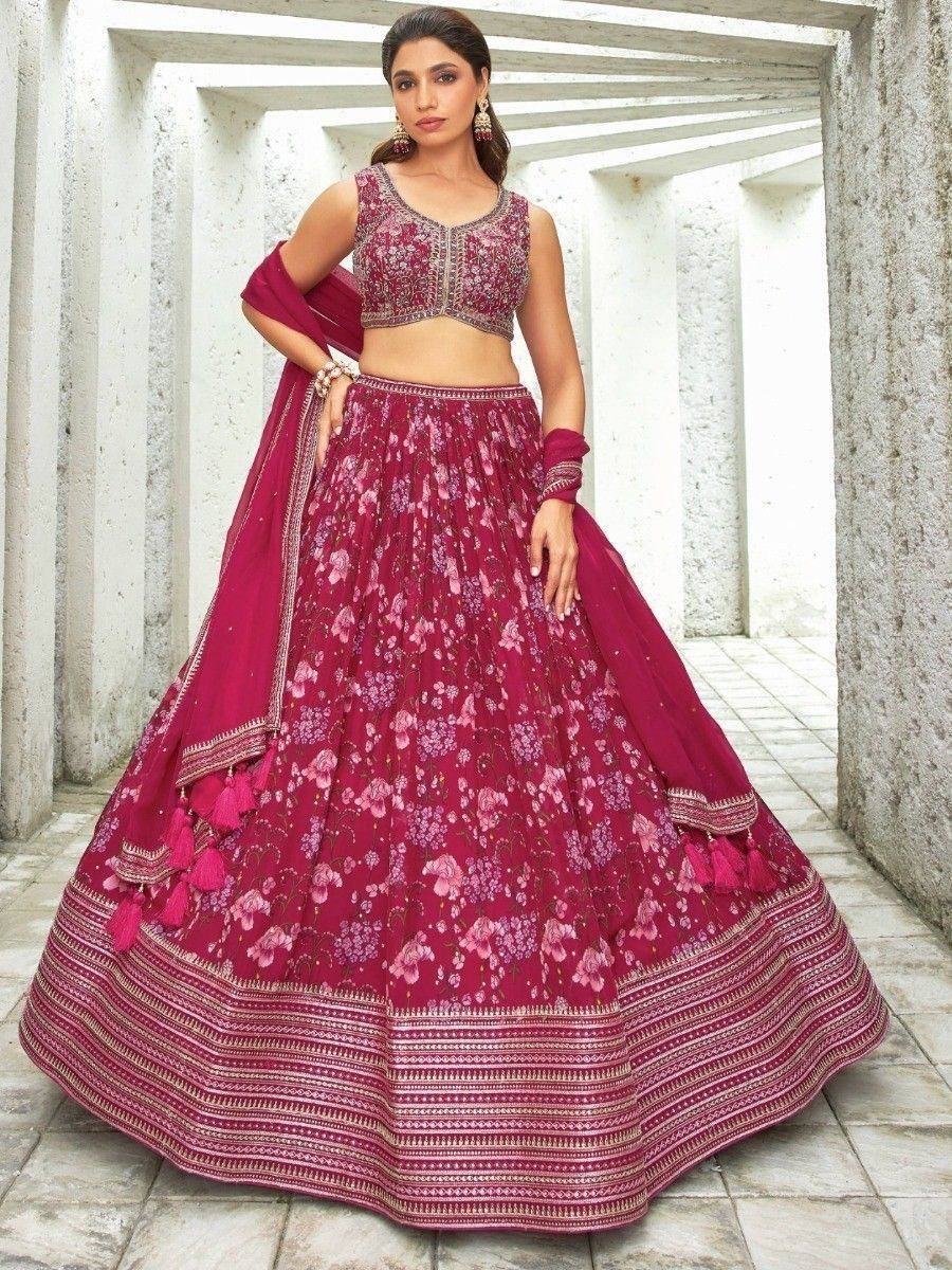 Pink floral lehenga choli with embroidered blouse and tassels, perfect for Indian ethnic occasions