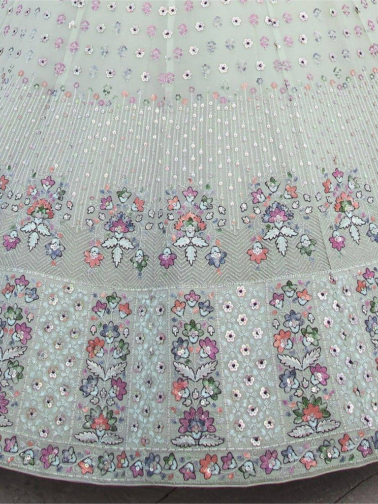 Pastel green lehenga skirt with floral embroidery and sequin detailing, ideal for Indian ethnic wear