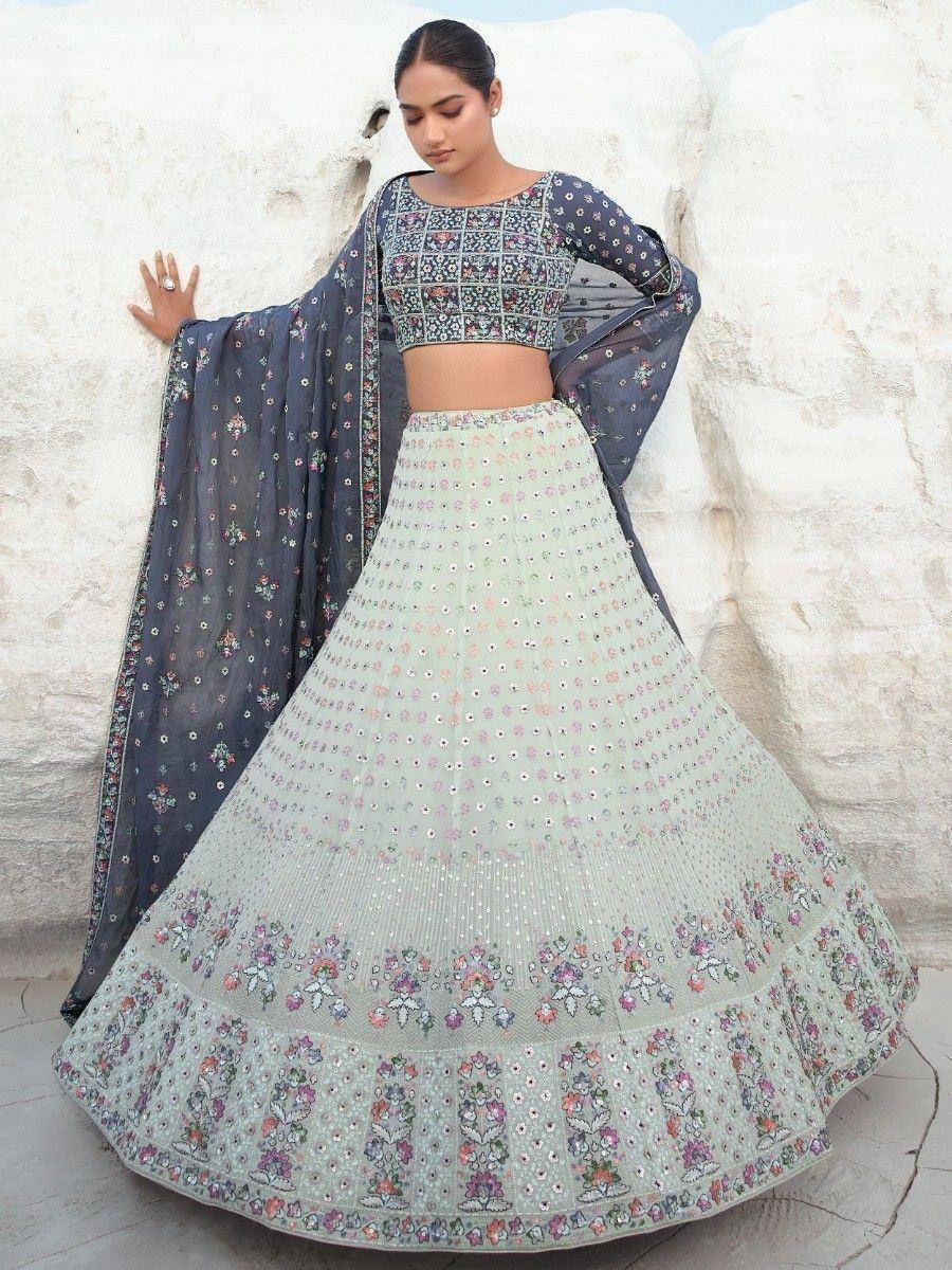 Elegant floral lehenga choli with mirror work, perfect for Indian ethnic occasions