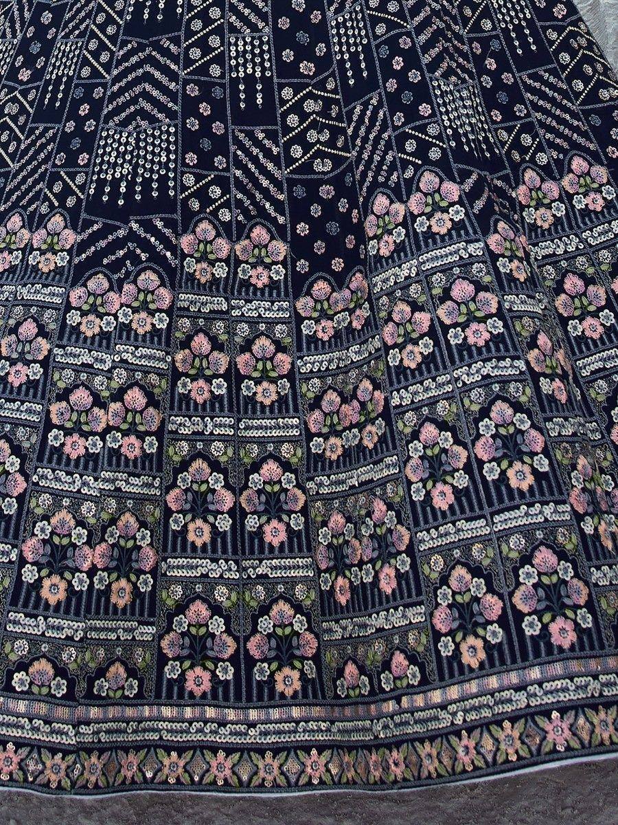 Black lehenga with pink floral embroidery and sequin detailing, ethnic Indian wear