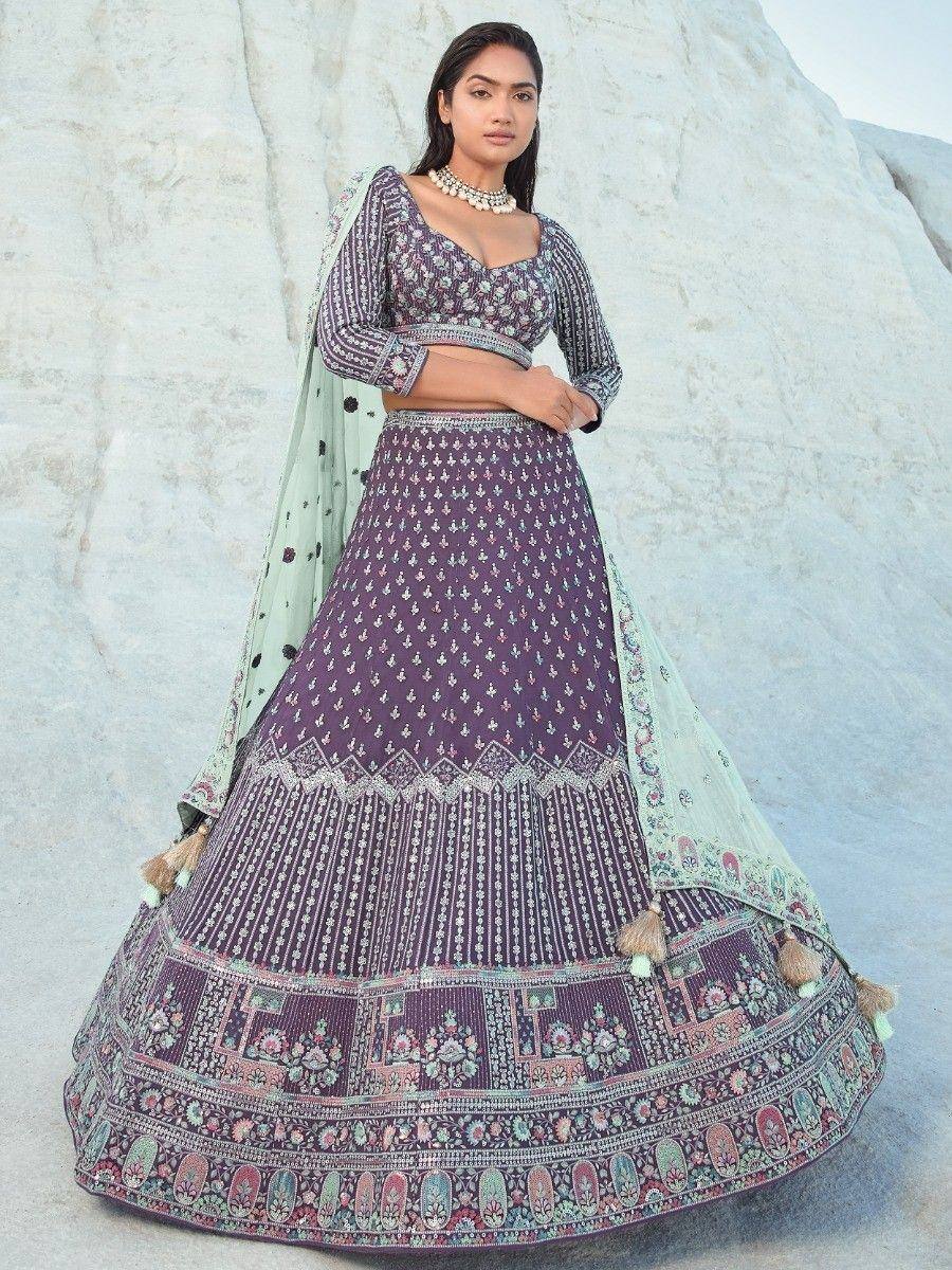 Purple printed lehenga choli with floral embroidery and mint dupatta, perfect for Indian ethnic occasions