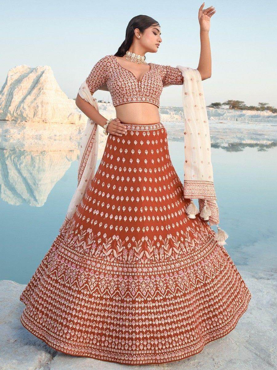 Charming Orange Sequins Georgette Reception Wear Lehenga Choli