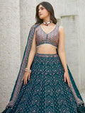 Pleasant Teal Blue Sequins Georgette Reception Wear Lehenga Choli