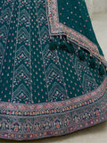 Pleasant Teal Blue Sequins Georgette Reception Wear Lehenga Choli