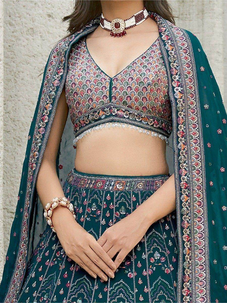 Pleasant Teal Blue Sequins Georgette Reception Wear Lehenga Choli