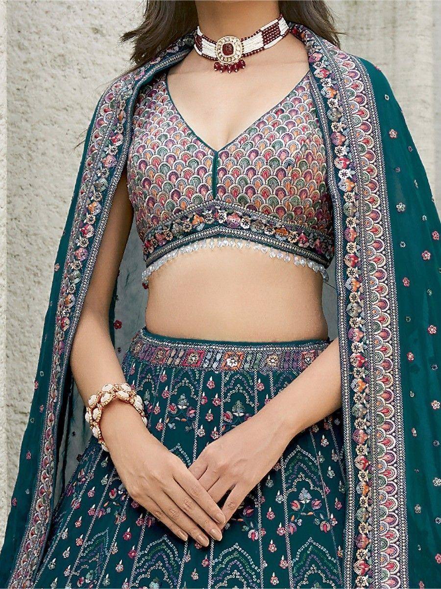 Teal embroidered lehenga choli with floral dupatta, perfect for Indian ethnic wear occasions