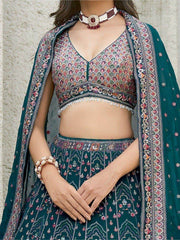 Pleasant Teal Blue Sequins Georgette Reception Wear Lehenga Choli