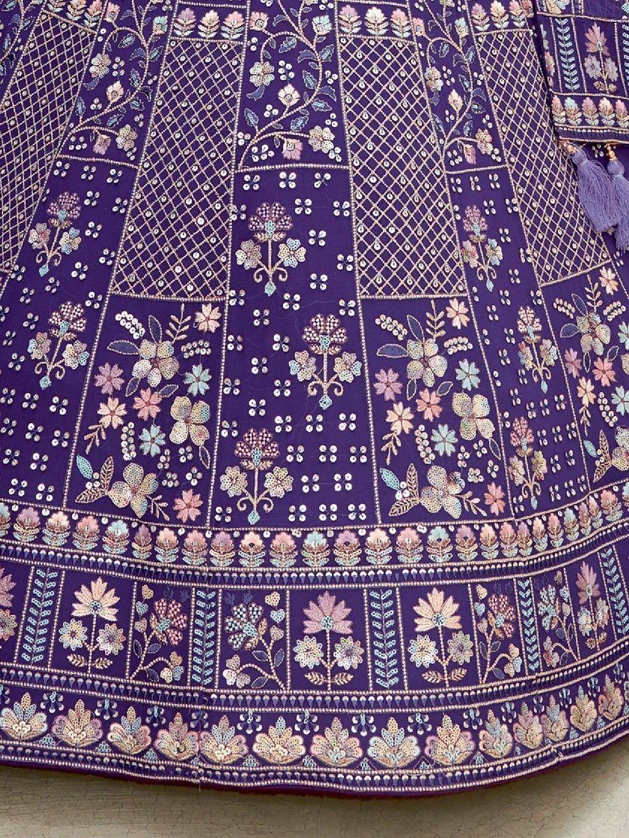 Purple ethnic lehenga with floral embroidery and mirror work, perfect for Indian weddings and festivals