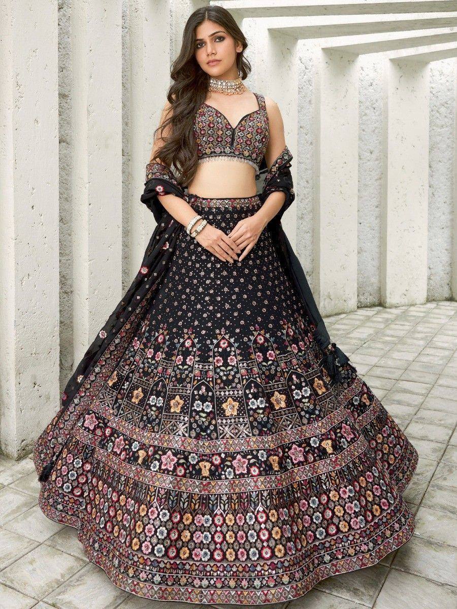 Black floral embroidered lehenga choli with off-shoulder dupatta, perfect for Indian weddings and festive occasions.