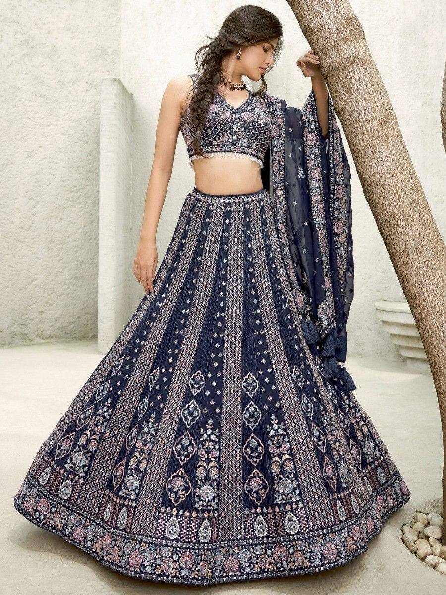 Navy blue embroidered lehenga choli with floral patterns, perfect for Indian ethnic wear occasions