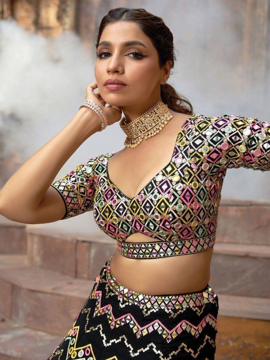 Designer lehenga choli with mirror work, ethnic wear for women, vibrant Indian fashion