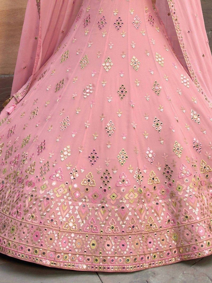 Pink designer lehenga with intricate mirror and embroidery work, perfect for Indian ethnic wear occasions