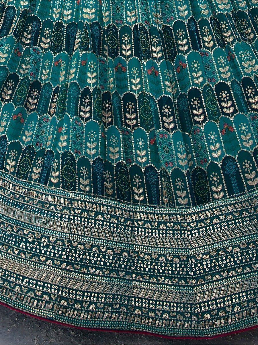 Teal embroidered lehenga skirt with floral motifs and sequin border, Indian ethnic wear